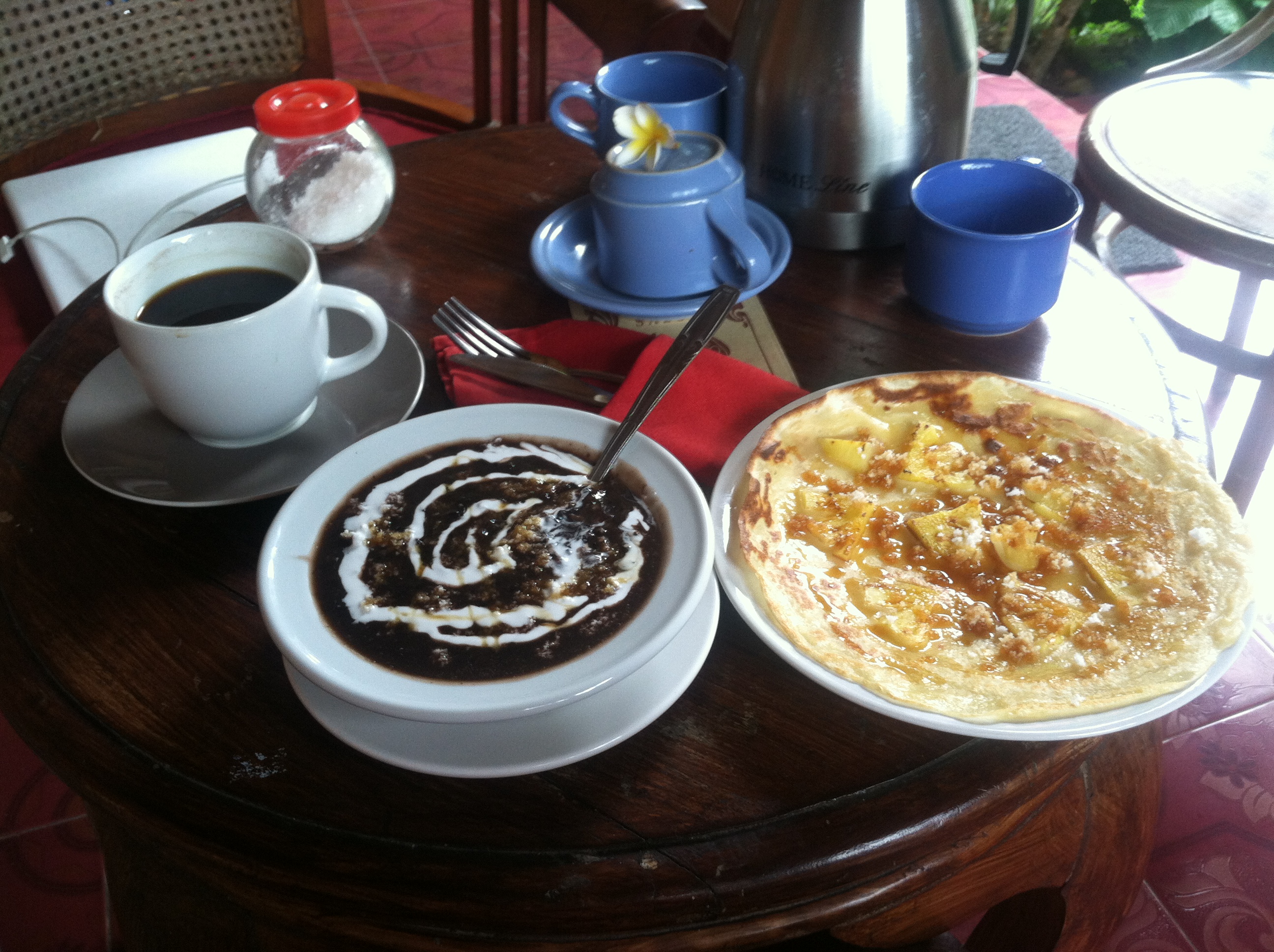 Breakfast! Black Rice Pudding, pineapple pancake and coffee, and a bowl of fruit